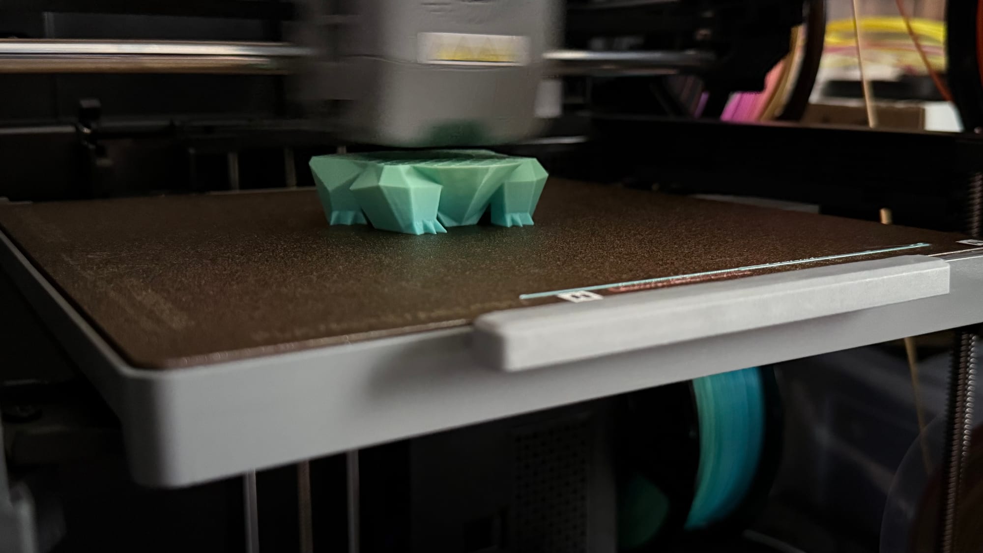 A Bulbasaur being made by a  3D printer