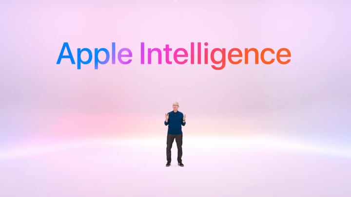 Tim Cook standing in a pink tinted empty void below the rainbow colored words "Apple Intelligence"