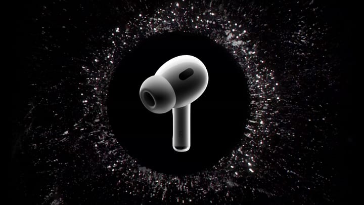 An AirPod Pro with water surrounding it vibrating to a sound wave